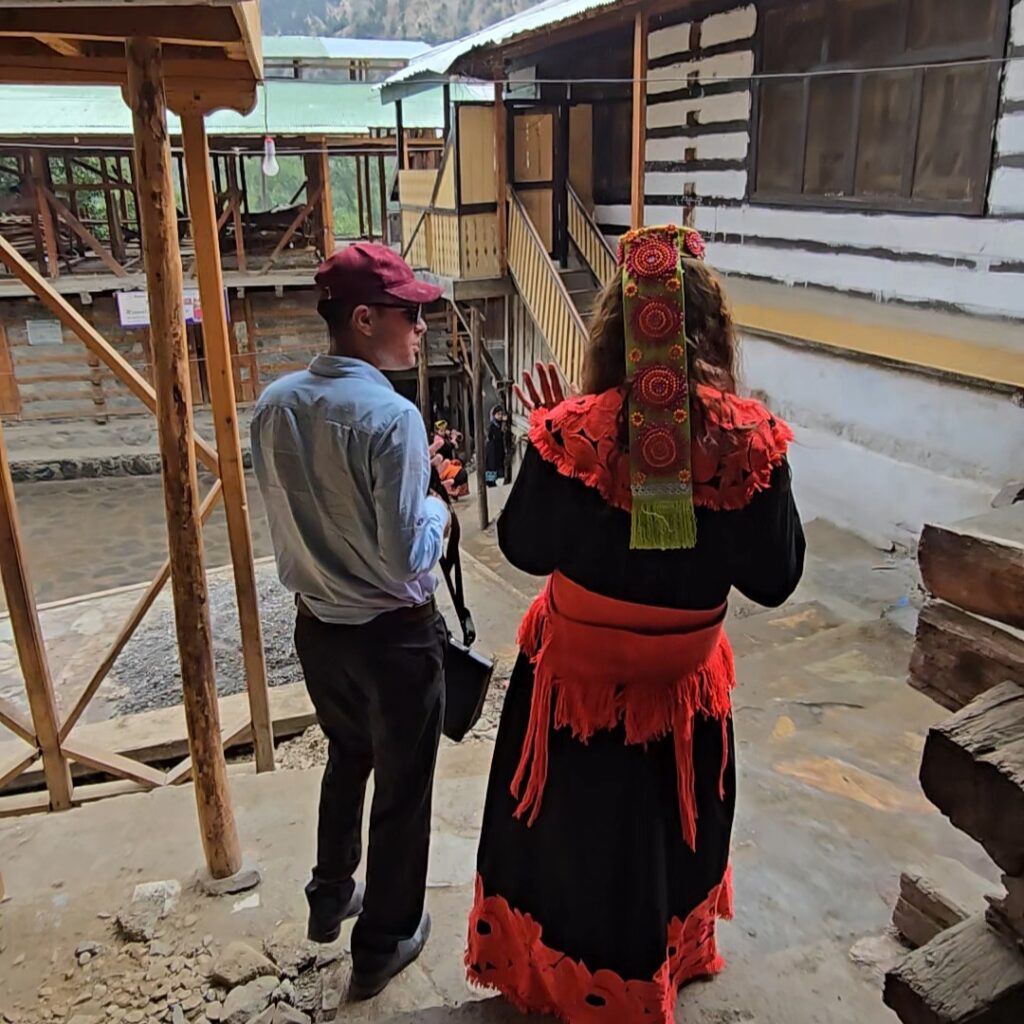 Guest in traditional Kalash dress with local woman