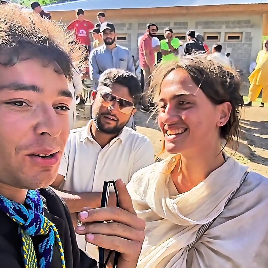 Saqib with smiling international guests